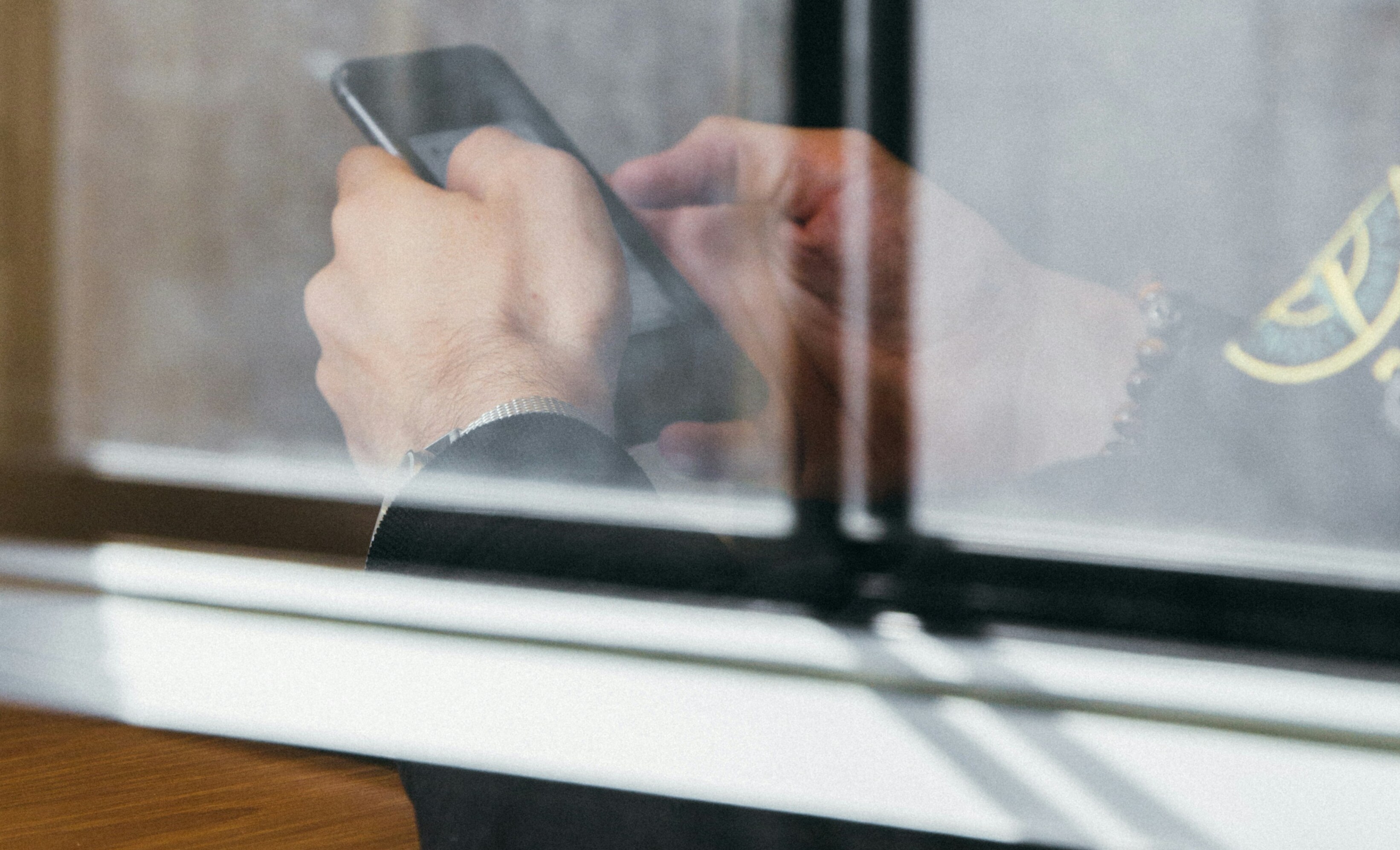 A man holding the phone.